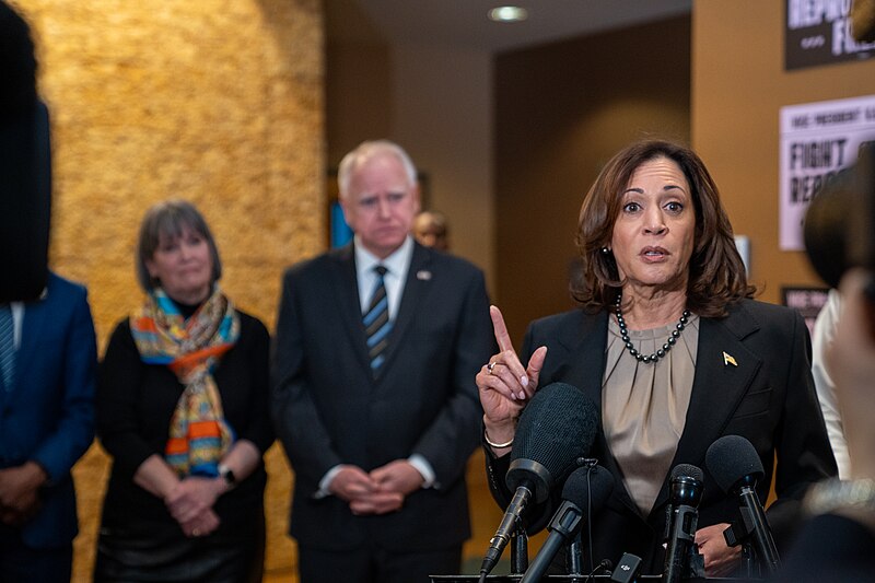 Kamala Harris and Tim Walz at a press event