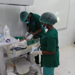 What a Difference an Ultrasound Machine Makes 1 Mother Amadea Mission Hospital with baby